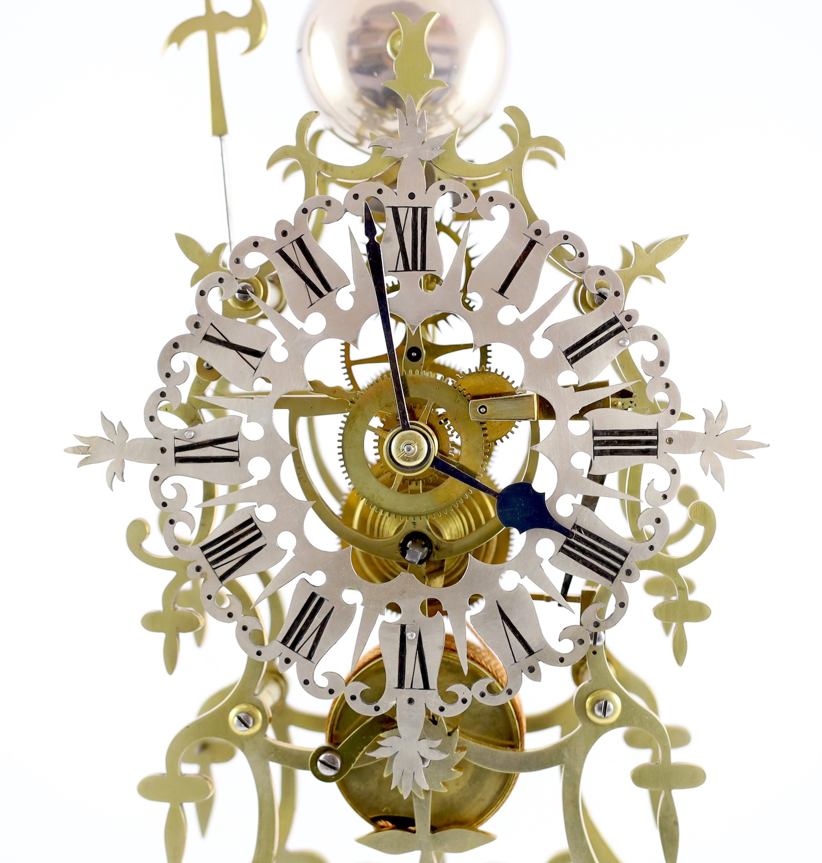 A Victorian brass skeleton timepiece, 53cm high overall, together with matching wall bracket